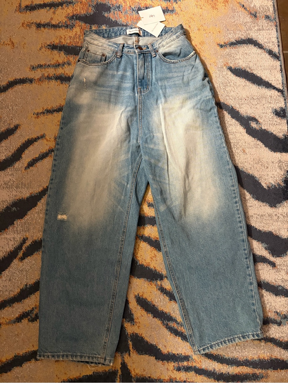 The Frankie Shop "Tanner Bleach Jeans" in
Worn Wash / Bleach Wash.